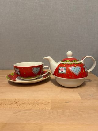 Taza con tetera incorporada