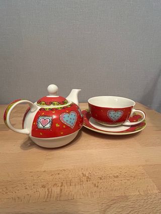 Taza con tetera incorporada