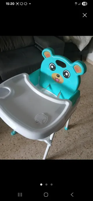 Trona de bebé azul con diseño de oso