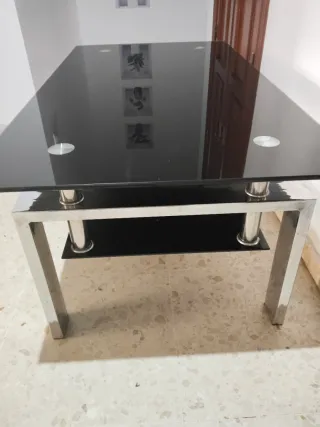 Tavolo da centro in vetro nero e acciaio