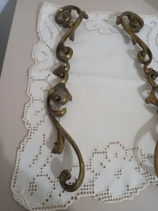 Coppia di fregi in ottone