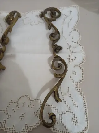 Coppia di fregi in ottone