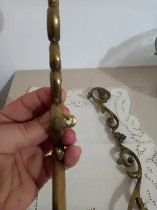 Coppia di fregi in ottone