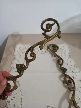 Coppia di fregi in ottone