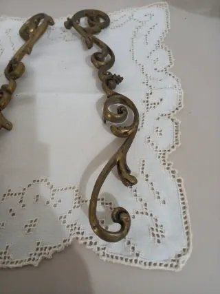 Coppia di fregi in ottone