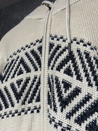 Cárdigan con cremallera y estampado geométrico