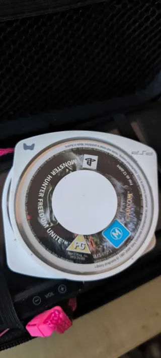 PSP E1004 Nero + Caricatore + Giochi