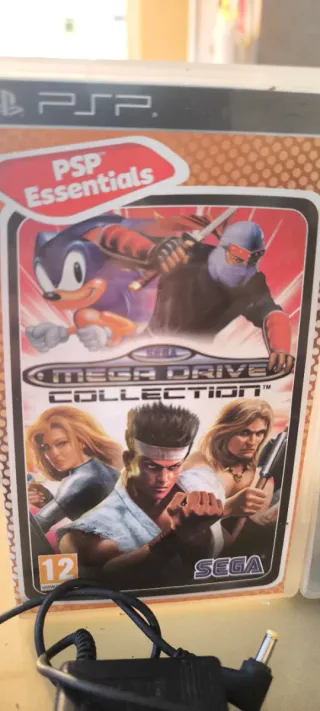 PSP E1004 Nero + Caricatore + Giochi