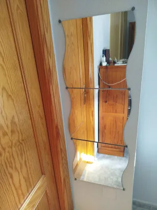 Espejo de pared ondulado