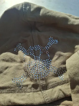 Sudadera con cremallera y brillos