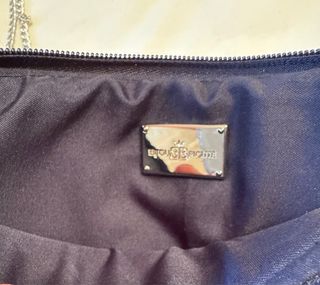 Bolso de fiesta con flores y pedrería