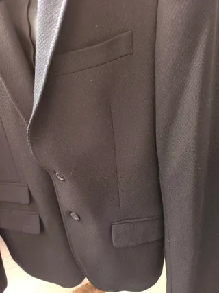 Americana chico negra bolsillos delanteros e inter