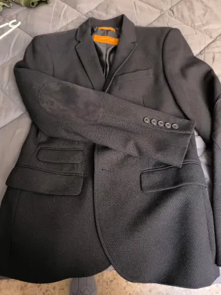 Americana chico negra bolsillos delanteros e inter