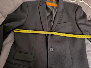 Americana chico negra bolsillos delanteros e inter