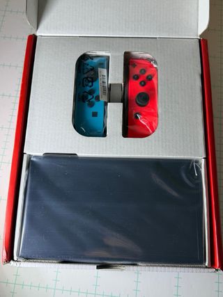 Nintendo Switch OLED Blu/Arancione
