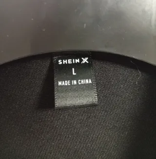 Cazadora negra con dibujo de Shein