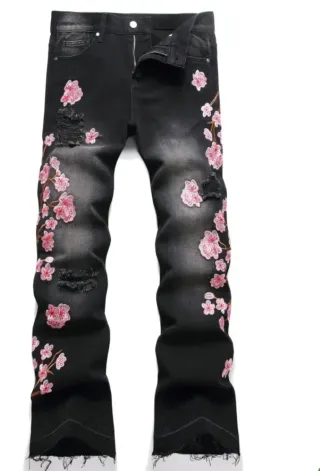 Jeans neri con ricamo floreale rosa