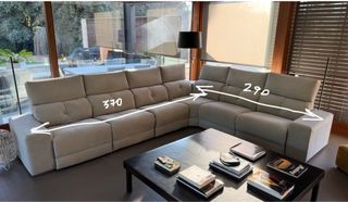 Sofá modular esquinero de tela y abatible.