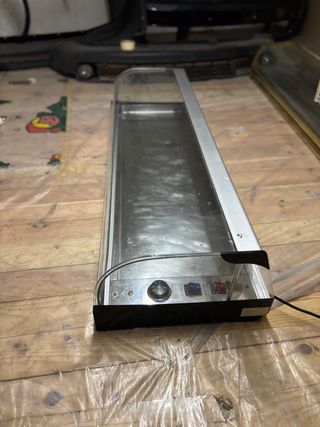 Vitrina expositora con calor para bar