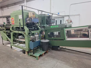 Grupo de montaje y tapadora