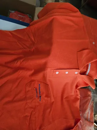 Camisetas Polo Naranja con Logo.