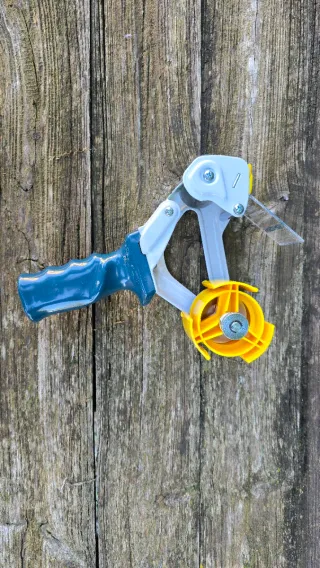 Precintadora de seguridad azul y amarilla