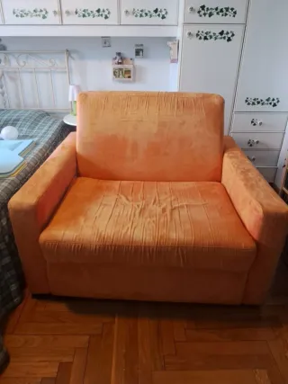 Poltrona letto arancione in tessuto
