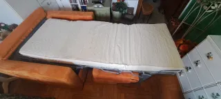 Poltrona letto arancione in tessuto