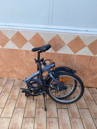 Bicicleta plegable gris btwin