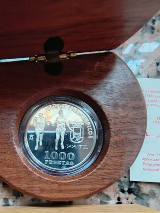 Lote numero 3 cuatro monedas plata JJOO, Descubri.