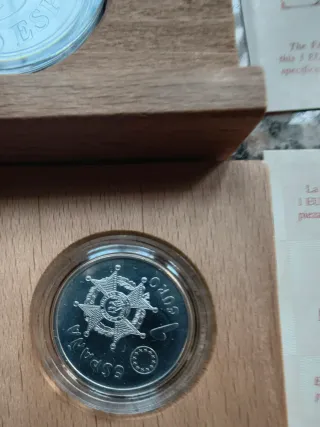 Lote numero 3 cuatro monedas plata JJOO, Descubri.