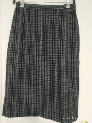 Conjunto,Traje de chaqueta, falda y blusa.