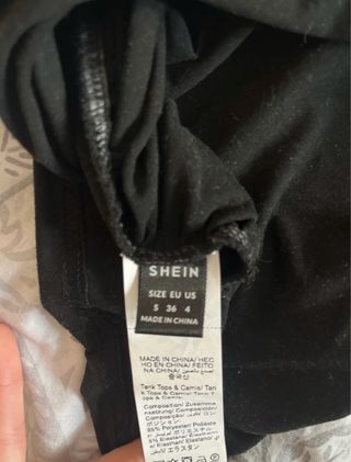 Camisetas gris, blanca y negra tirantes