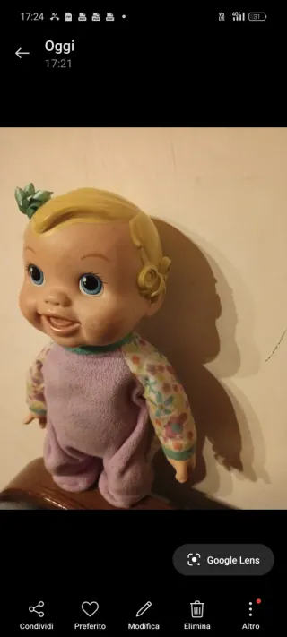 Bambola Baby Alive con fiocco