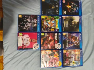 PS4 (PlayStation 4) con 2 mandos y 10 juegos