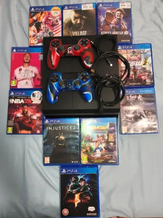 PS4 (PlayStation 4) con 2 mandos y 10 juegos