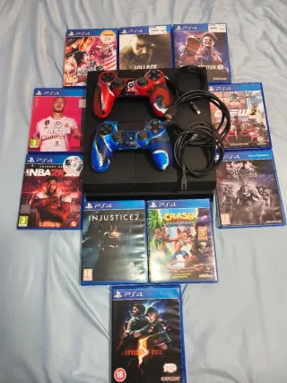 PS4 (PlayStation 4) con 2 mandos y 10 juegos