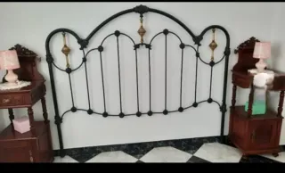 Cabecero de forja negro y dorado