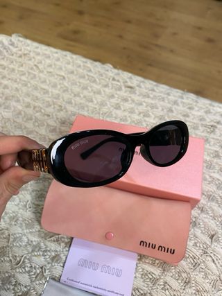 Gafas de sol Miu Miu negras