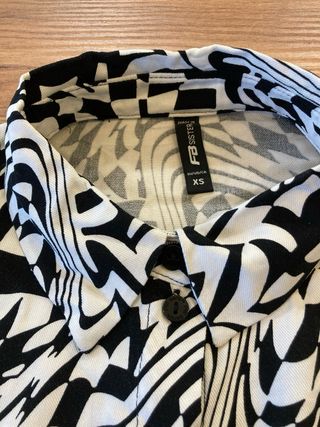 Camisa cropped New Yorker Talla XS