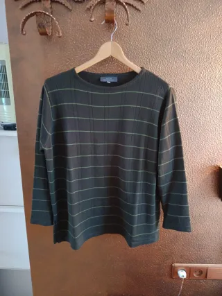 Jersey verde talla XL.