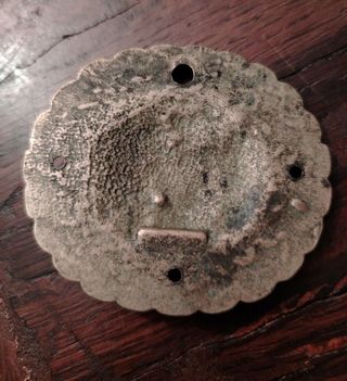 Vecchia borchia/medaglione con angelo