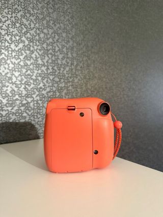 Cámara Instax Mini 7 Naranja Claro
