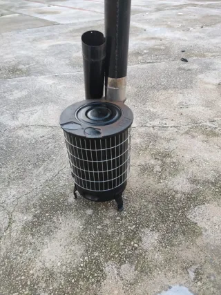 Estufa leña redonda metal negra