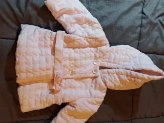 Giubbino neonato rosa trapuntato con cappuccio