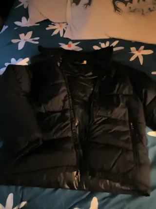 Plumífero Polo Negro Talla L. No verdadero