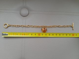 Bracciale in metallo rodiato oro con cuore resina