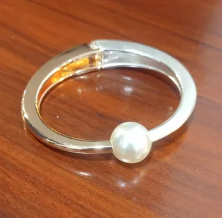 Pulsera tipo esclava con perla