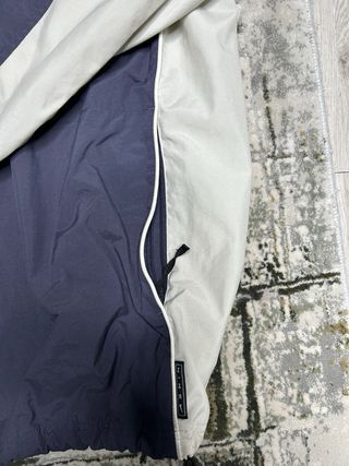 Chaqueta Nike Repel Azul y Blanca