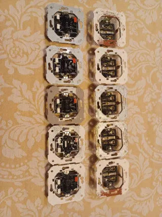 5 Conmutadores y 5 Interruptores